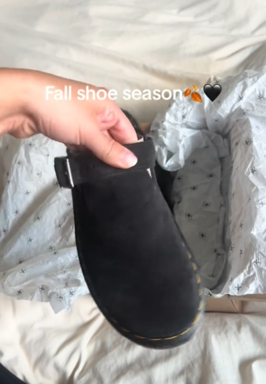 Black suede clogs in autumn
